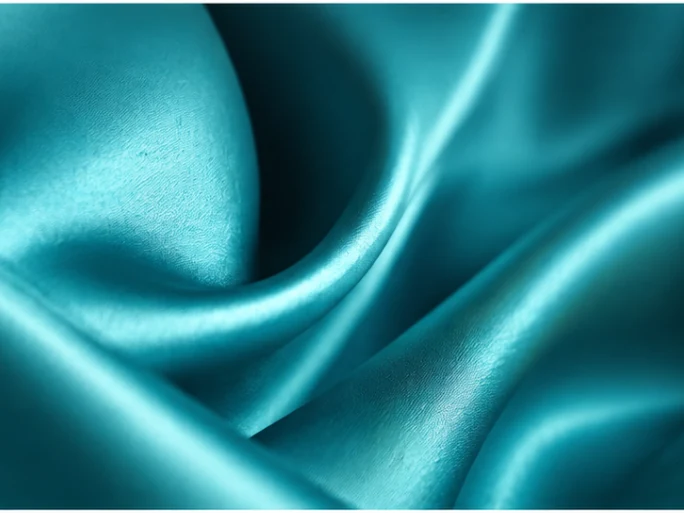 Teal sustainable PU leather with smooth folded finish